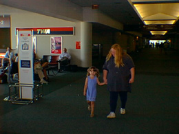 Teresa with Kayla (our granddaughter) at Kenny's departure for his mission in Salt Lake City