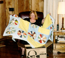 The quilt the Relief Society made her - this is her right after she donated her hair to "Locks of Love"